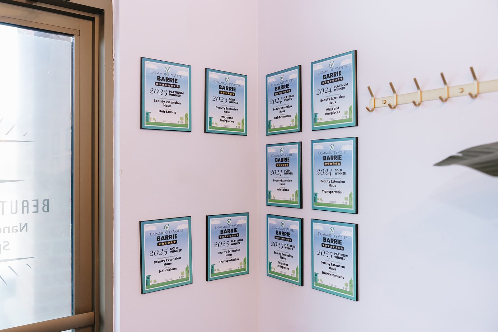 CommunityVotes Barrie award certificates on the studio wall