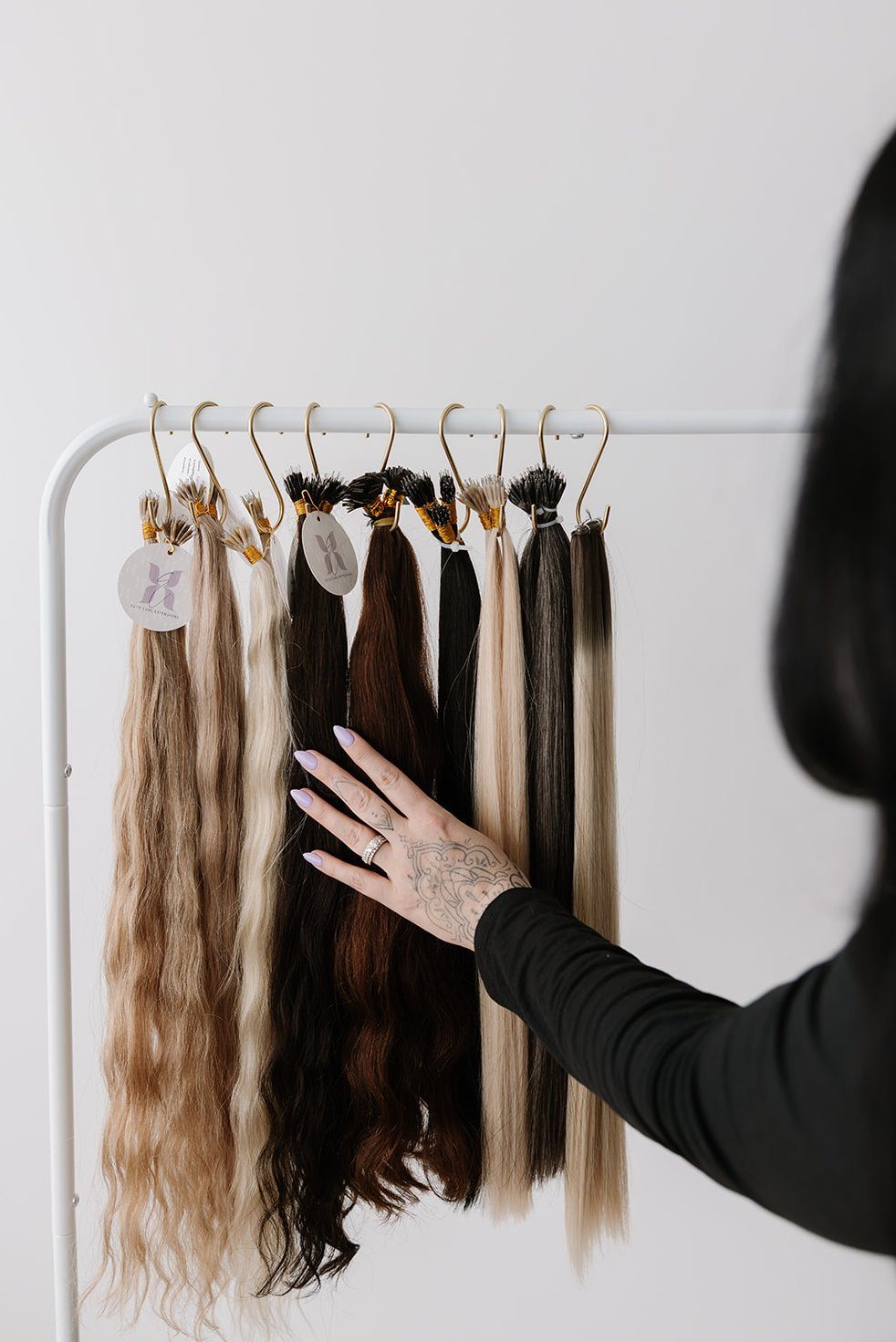 Brushing out a hair bundle at the styling station